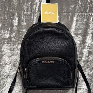 Michael Kors Black Leather Backpack with Gold Accents